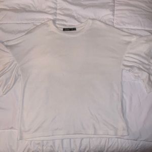 White top with ruffled sleeves